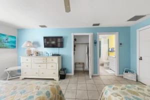 English Garden Bedroom blue and white suite with dresser and a spacious closet - Windemere Inn Florida bed and breakfast