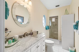 Summer Garden Bathroom vanity and standing shower - Windemere Inn Florida bed and breakfast