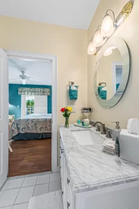 Summer Garden Bathroom granite marbled vanity - Windemere Inn Florida bed and breakfast