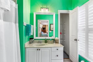 Windsong Bathroom vanity and large linen closet - Windemere Inn Florida bed and breakfast