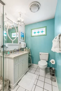 Windsong Bathroom blue and white bathroom vanity - Windemere Inn Florida bed and breakfast