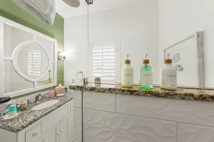 Forever Spring Bathroom glass shower and vanity - Windemere Inn Florida bed and breakfast