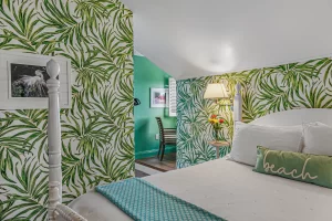 Lookout Bedroom queen bed and alcove with working station - Windemere Inn Florida bed and breakfast