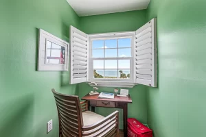 Lookout Work Station green and white suite wooden desk and with an ocean view - Windemere Inn Florida bed and breakfast