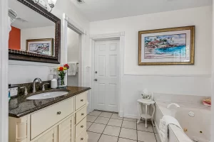 North Beach Bathroom with vanity and bathtub - Windemere Inn Florida bed and breakfast