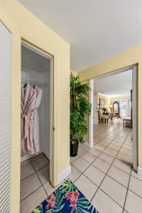 Seabreeze Bathroom yellow and white suite with a large closet - Windemere Inn Florida bed and breakfast